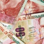 La devaluación del sol local frente al dólar estadounidense influyó en la inflación anual de Perú