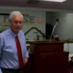 Ron Johnson runs away from reporters at an event in Milwaukee