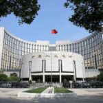 China emite proyecto de normas para regular transacciones relacionadas de holdings financieros