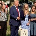 Trump grave thumbs up.