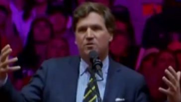 Tucker Carlson at Trump rally.