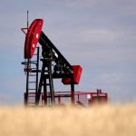 An oil pumpjack in a field