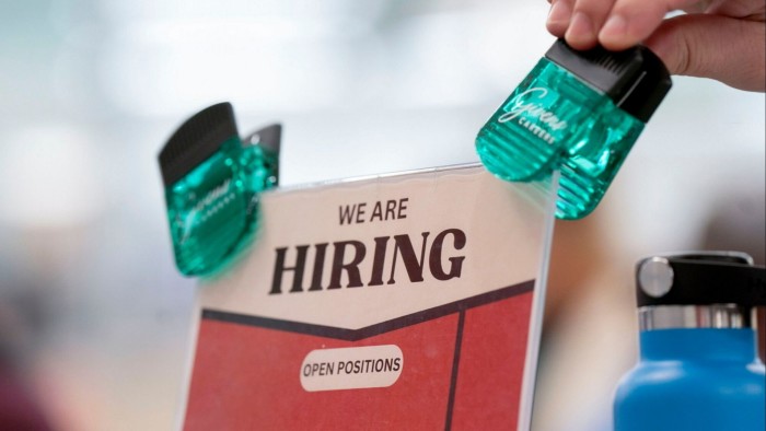 Hiring signage displayed at a job fair hosted in North Carolina