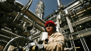 A worker at a Venezuelan oil production facility