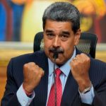 President Nicolas Maduro gestures during a news conference at Miraflores presidential palace in Caracas, Venezuela