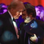 Donald Trump talks to Argentine President Javier Milei at Mar-a-Lago last year