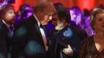 Donald Trump talks to Argentine President Javier Milei at Mar-a-Lago last year