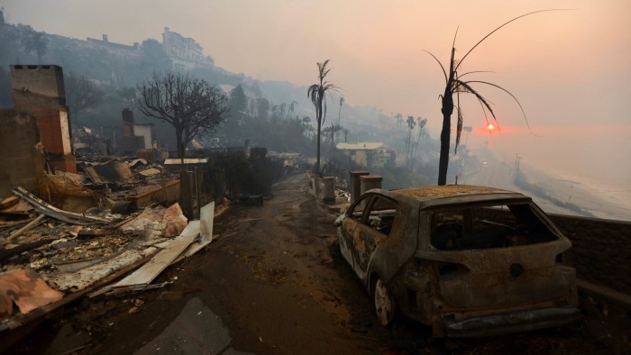 Sunrise over the Palisades neighborhood of Los Angeles shows the devastation left by wildfires