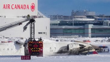 First responders work at the Delta Air Lines plane crash site at Toronto Pearson International Airport in Mississauga, Ontario, Canada on February 17 2025