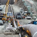 The last section of pipeline is assembled on the Trans Mountain pipeline expansion project near Laidlaw, British Columbia, Canada