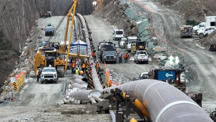 The last section of pipeline is assembled on the Trans Mountain pipeline expansion project near Laidlaw, British Columbia, Canada