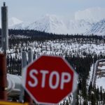 A part of the Trans Alaska Pipeline System runs through boreal forest past Alaska Range mountains near Delta Junction, Alaska