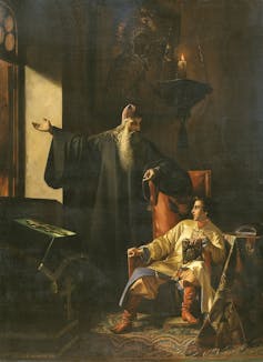 Una pintura muestra a un anciano con barba y un hombre sentado.